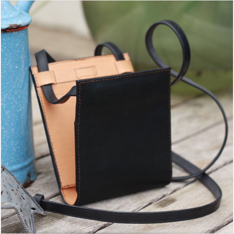 Un sac de créateur en cuir d'exception au design minimaliste, confectionné par un artisan d'Art sculpteur sur cuir - Made in Fra